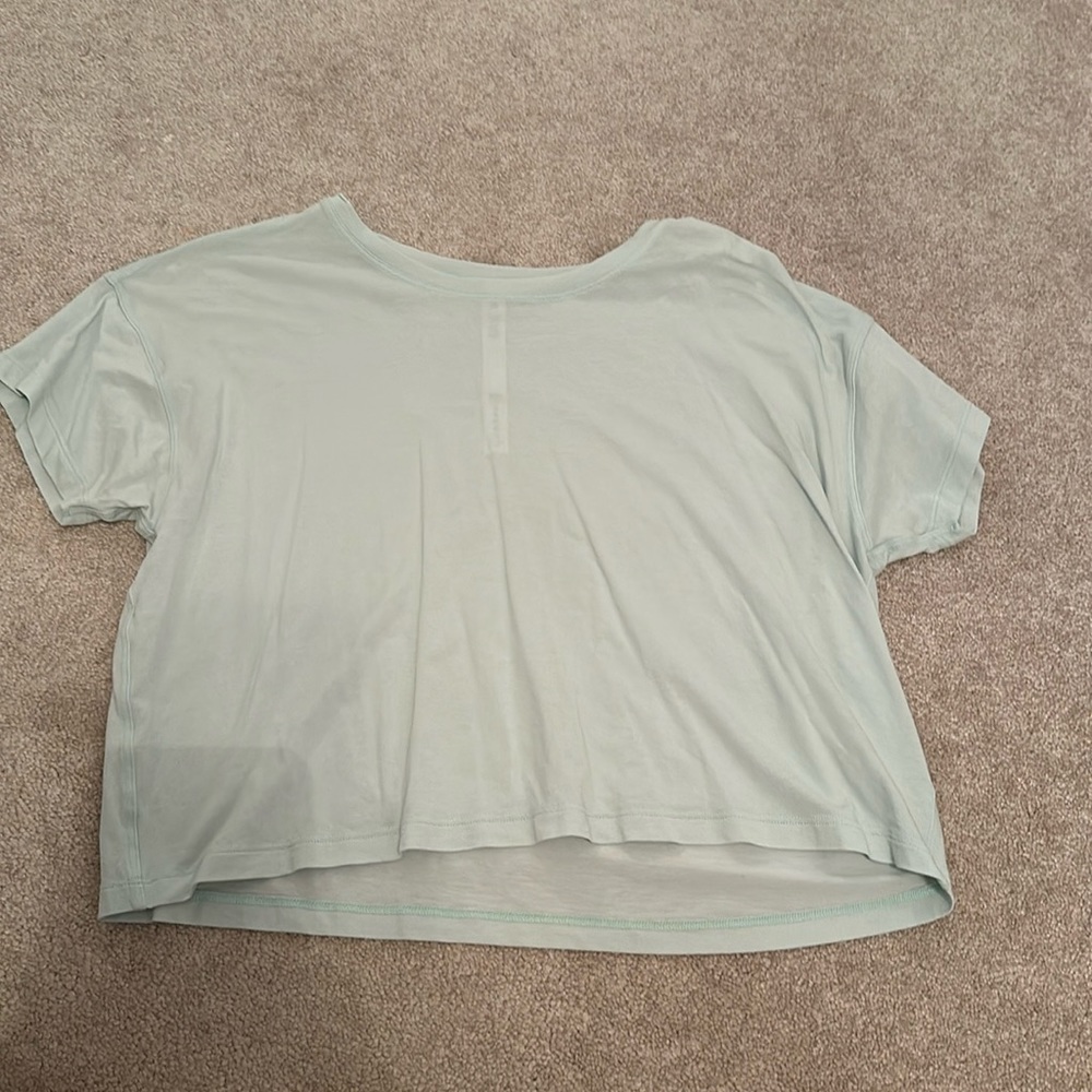 Light teal color, lululemon tshirt